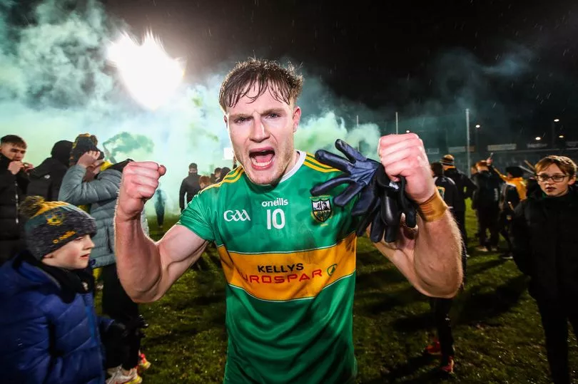 GAA side Glen celebrating a win at night