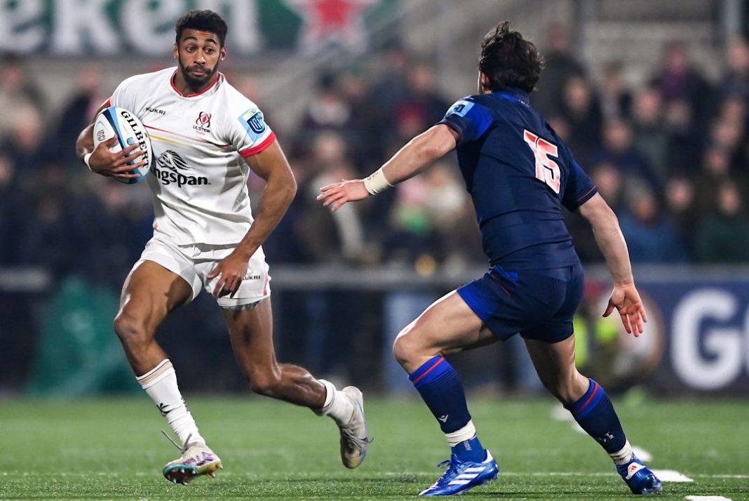 Ulster Rugby player evading a tackle