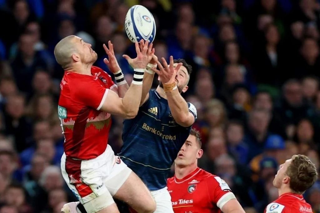 Leinster and Leicester players jumping for the ball