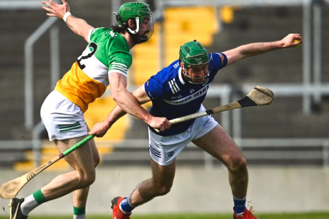 Laos and Offaly hurlers fighting for the sliotar