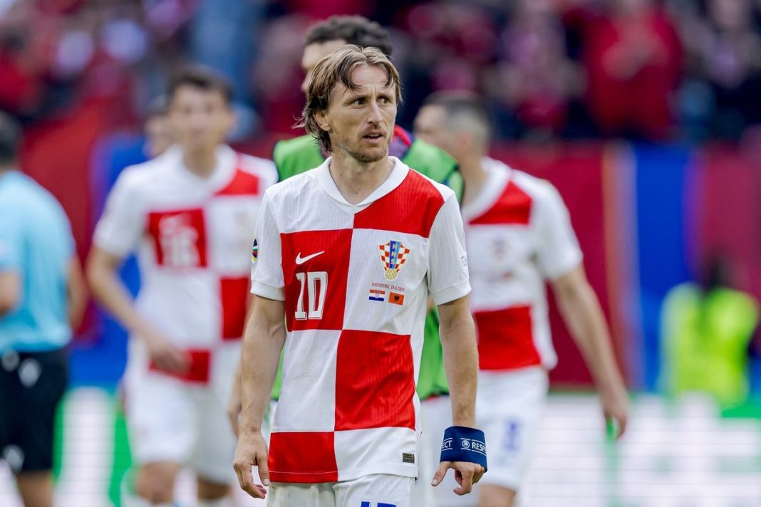 Luka Modric looking sad after the Albania game