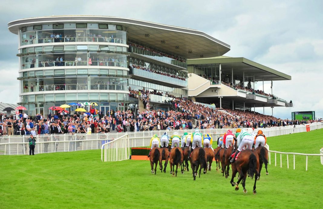 A photo of the horses rounding the final bend at the Galway Races