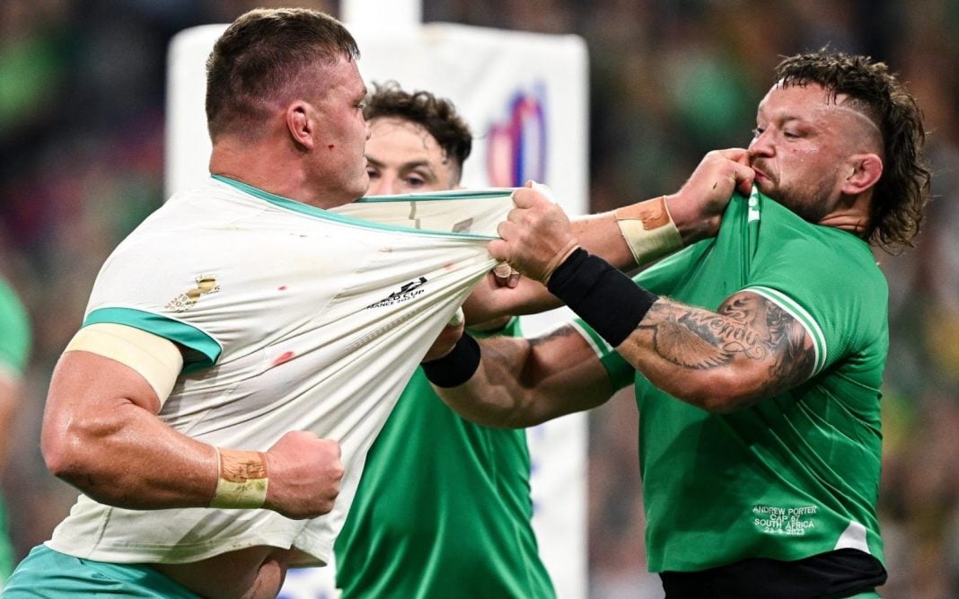Irish and South Africa players grabbing each others shirts