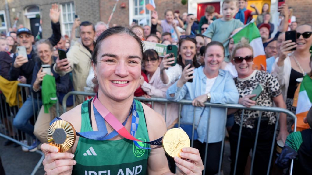 A photo of Irish boxer Kellie Harrington with her Paris and Tokyo Olympic gold medals