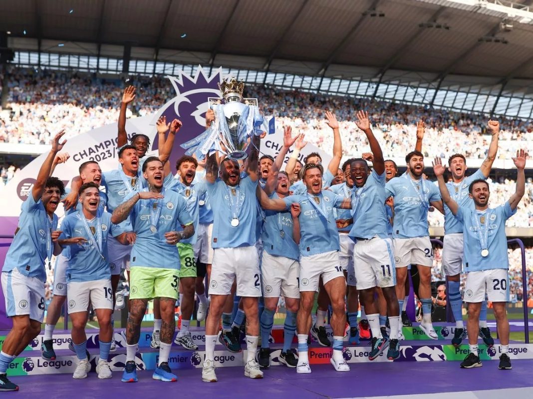 Manchester City players celebrating the title