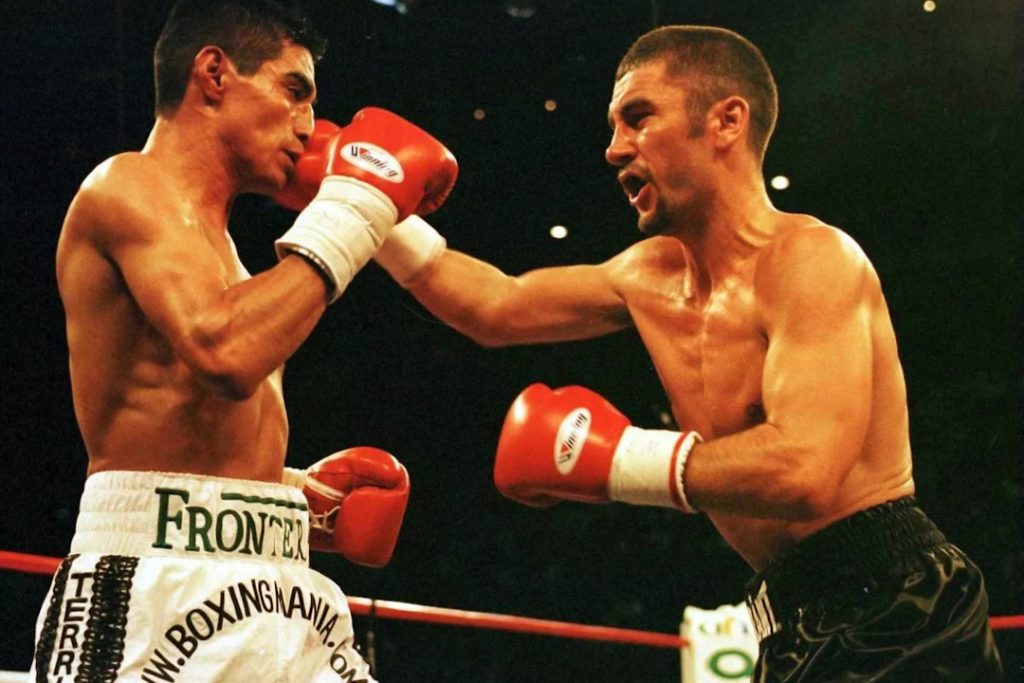 Wayne McCullough, one of the best Irish boxers ever, punching a fighter in the face