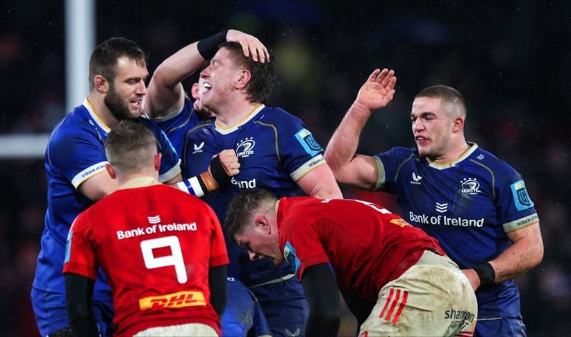 Munster Rugby Club players celebrating a try.